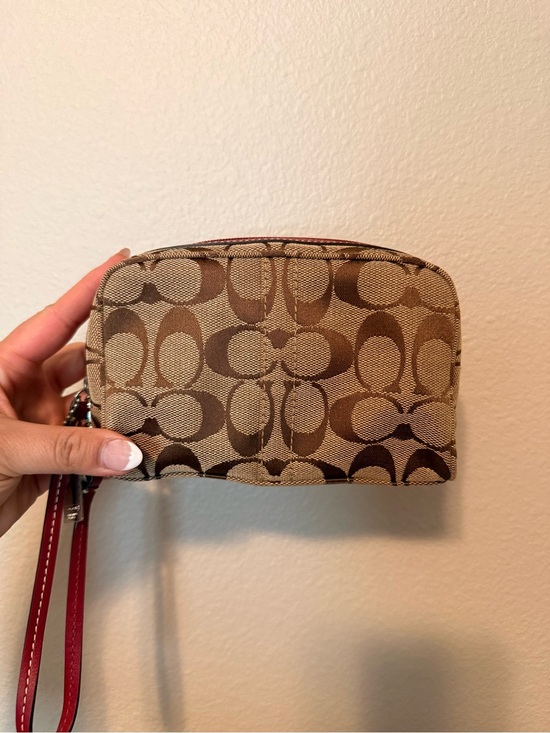Coach Handbags - Coach Signature Canvas Wristlet in Brown with Red Strap
